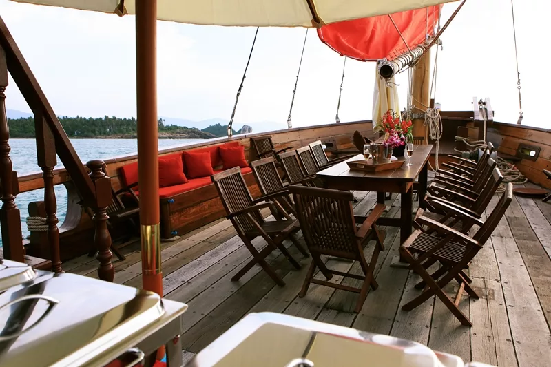 dining table ready on the red baron sailing yacht