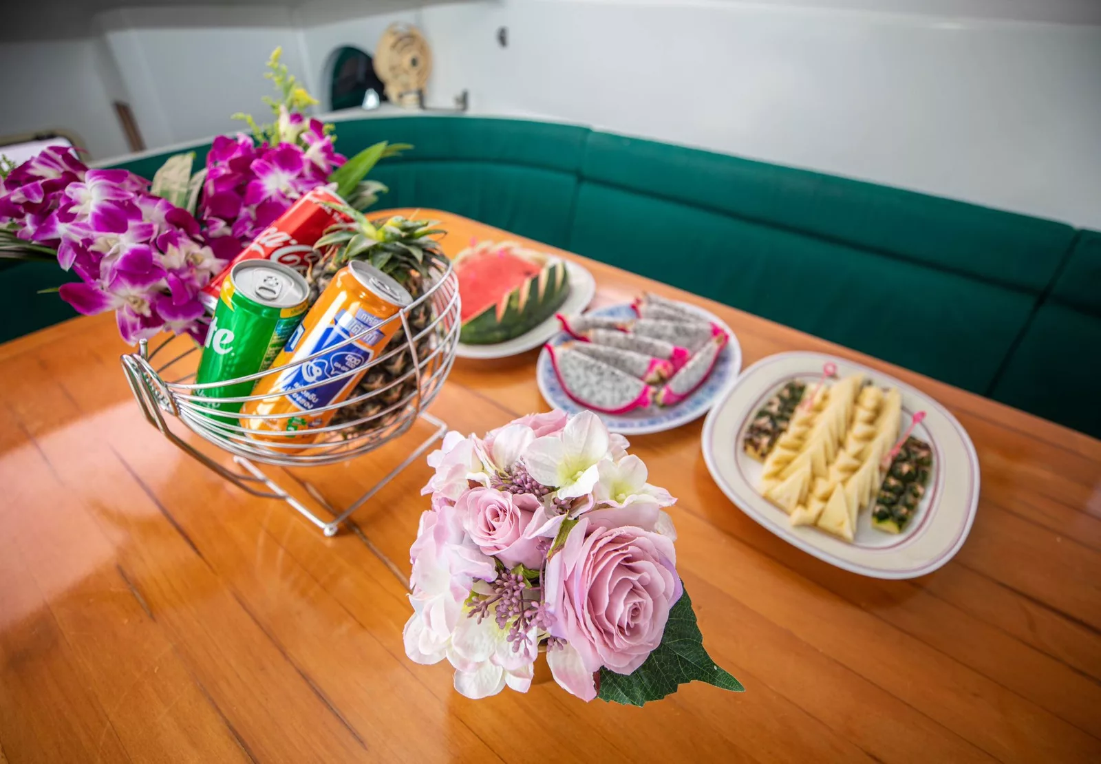 image showing food and drinks on a family friendly slider catamaran charter koh samui thailand