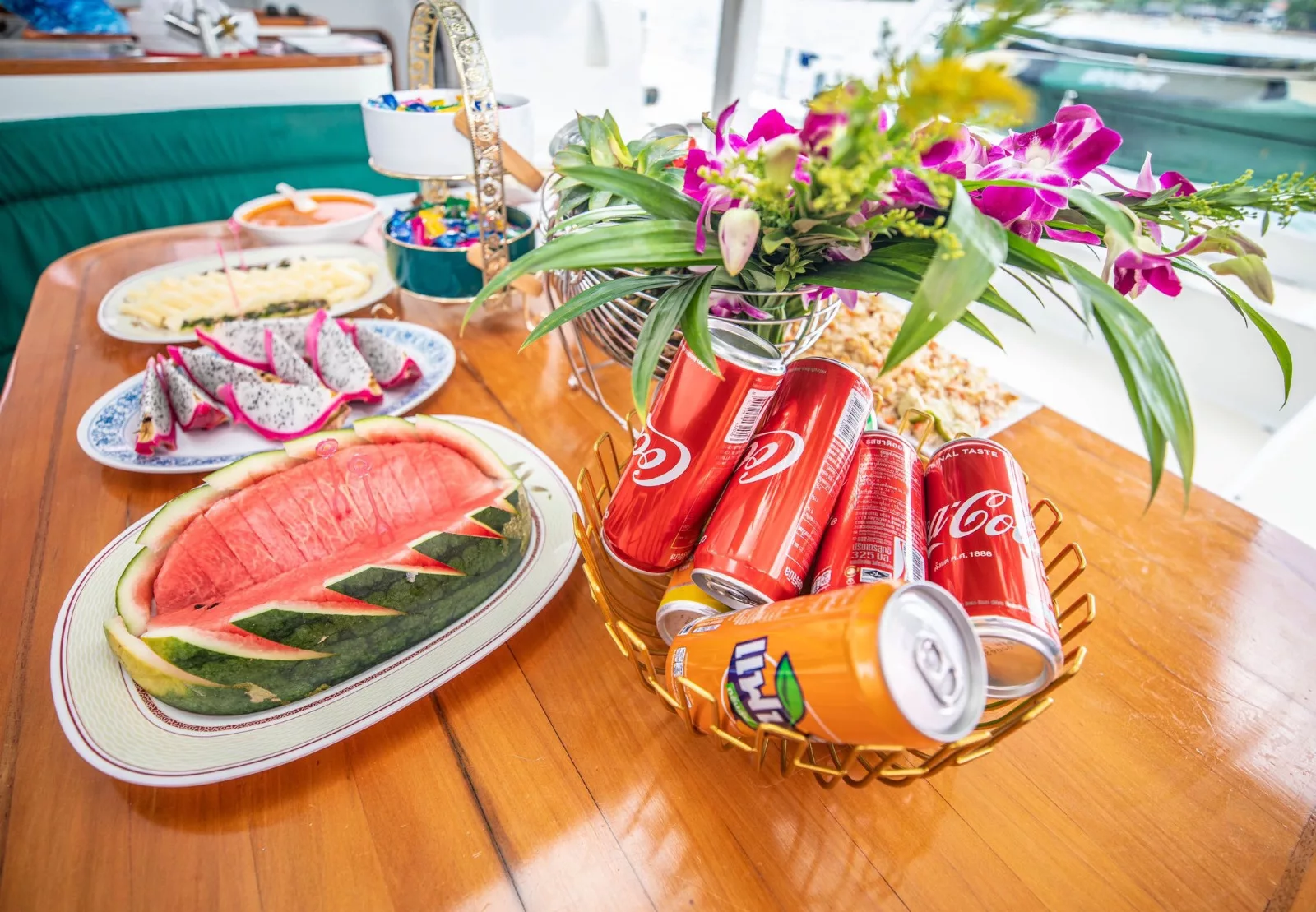 image showing fruit snacks and soft drinks on a family friendly slider catamaran charter koh samui thailand