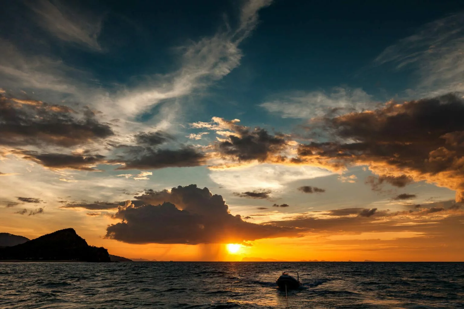 sunrise from the rear deck of the naga sailing yacht, near koh phangan