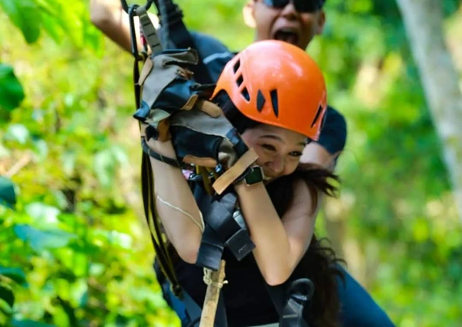 image showing happy tour ziplining on samui